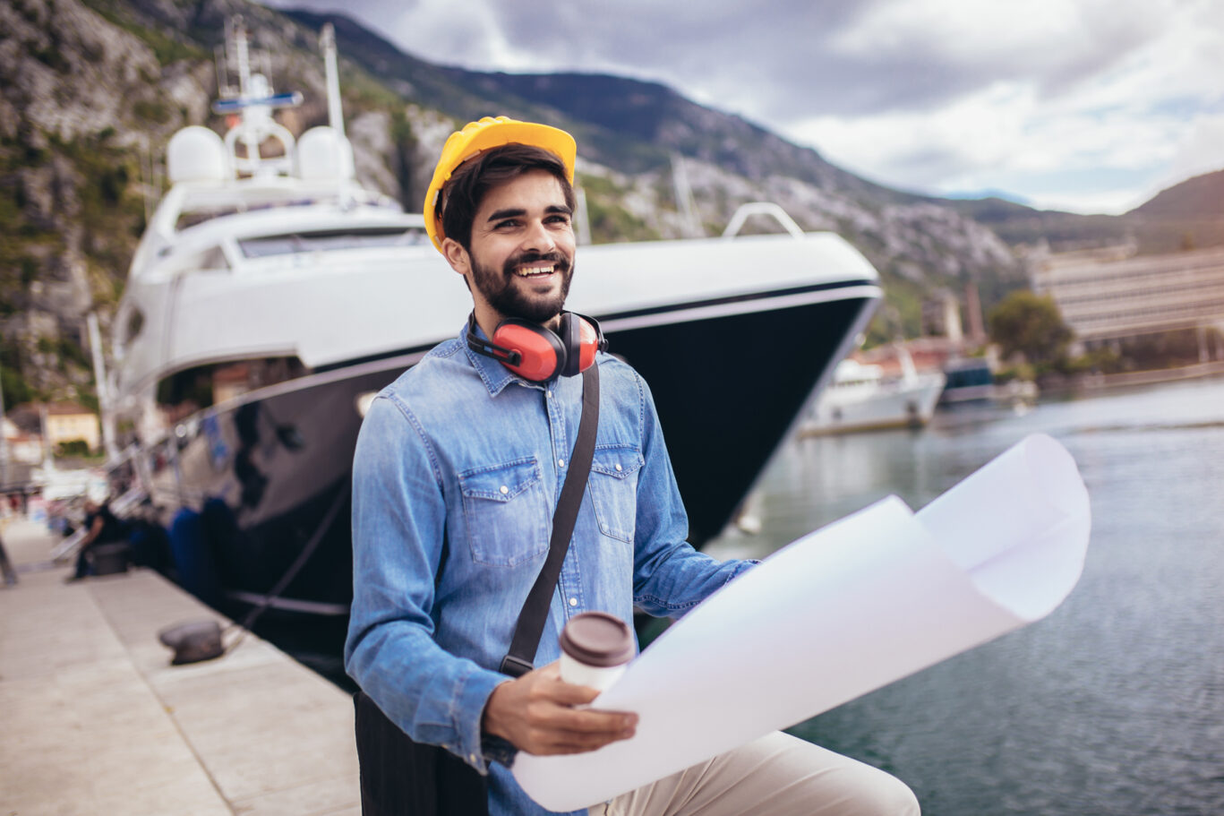Harbor Engineer Holding The Paper, Construction Work, Smiling.